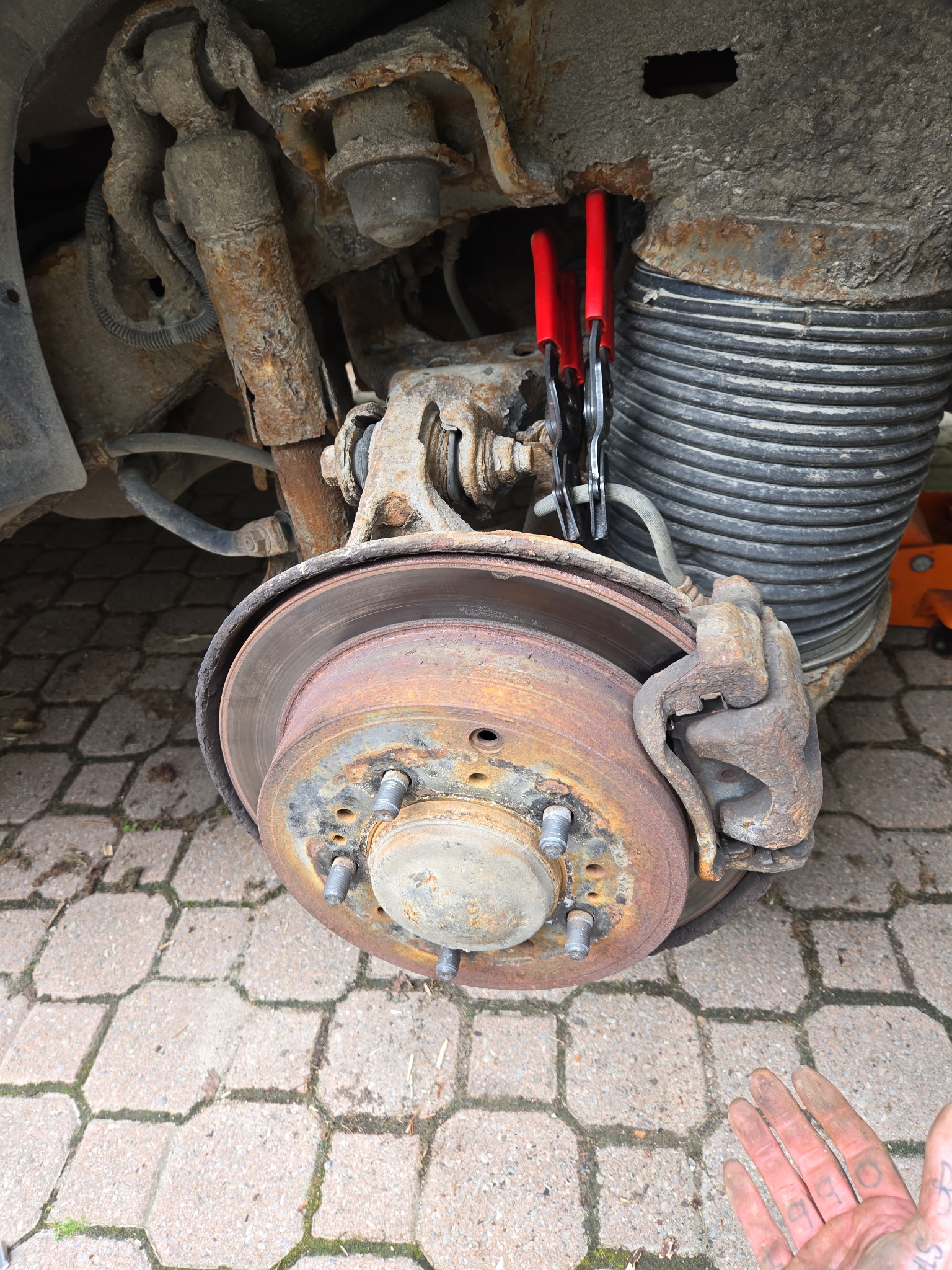 Worn rear brake corner before rebuild